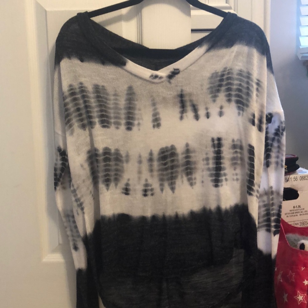 long sleeve blue/grey, black and white shirt